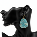 Iridescent Teal Crystal Dot Drop Earrings – White Background